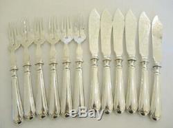 12 piece Antique Sterling Silver Plate Fish Cutlery Ornate Sea Monster Design