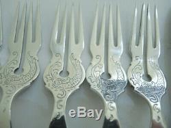 12 piece Antique Sterling Silver Plate Fish Cutlery Ornate Sea Monster Design