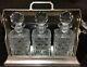 1900s Silver Tantalus with 3 Decanters-made in England, with original green felt