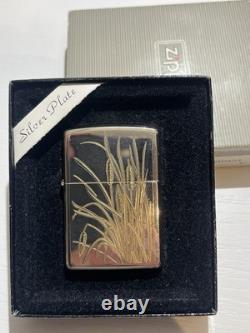 1994 ZIPPO CATTAILS SILVER PLATE WITH 24K INLAY UNFIRED ORIGINAL BOX EXCELLENt