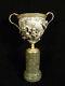 19th CENTURY SILVER PLATED BRONZE MYTHOLOGICAL RELIEF VASE ON MARBLE PEDESTAL