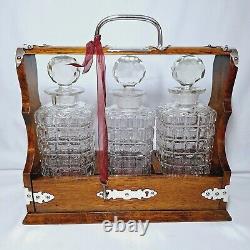 ANTIQUE 3 BOTTLE ENGLISH OAK & SILVER PLATE DRINKS TANTALUS (Circa 1880's)