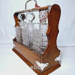 ANTIQUE 3 BOTTLE ENGLISH OAK & SILVER PLATE DRINKS TANTALUS (Circa 1880's)