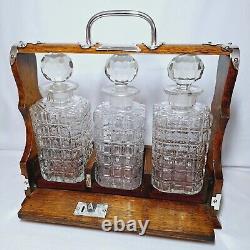 ANTIQUE 3 BOTTLE ENGLISH OAK & SILVER PLATE DRINKS TANTALUS (Circa 1880's)
