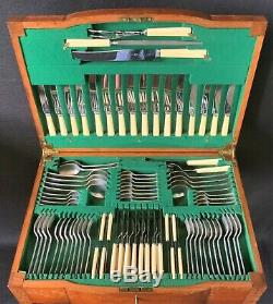 A Fine George V Walnut Cased Fitted Canteen Table Of Silver Cutlery 8 Persons