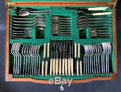 A Fine George V Walnut Cased Fitted Canteen Table Of Silver Cutlery 8 Persons