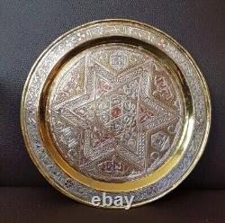 A Mamluk Revival silver-inlaid brass TrayEgypt or Syria, circa 1900