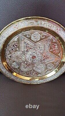 A Mamluk Revival silver-inlaid brass TrayEgypt or Syria, circa 1900