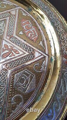 A Mamluk Revival silver-inlaid brass TrayEgypt or Syria, circa 1900
