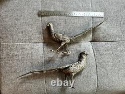 A pair of vintage Italian silver plated fancy pheasants or Peacocks