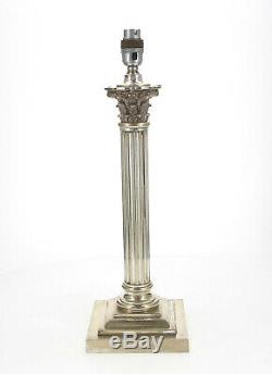 A silver plated Corinthian Column lamp Signed G. S Circa 1900 45 cm
