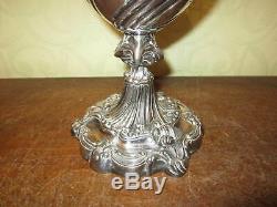 An old Walker & Hall silver plated oil lamp