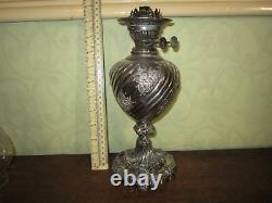 An old Walker & Hall silver plated oil lamp