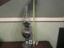 An old Walker & Hall silver plated oil lamp