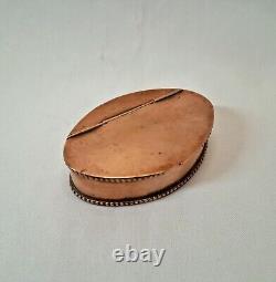 Antique 19th Century copper snuff box, with remnants of silver plate internally