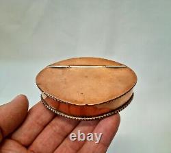 Antique 19th Century copper snuff box, with remnants of silver plate internally