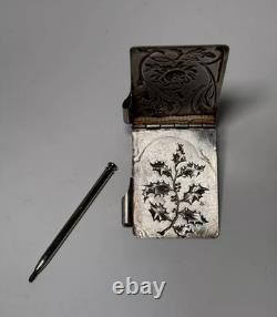 Antique Art Nouveau silver-plated metal dance card with floral motifs