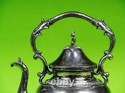 Antique Elegant Silver Plated Teapot With Original Stand And Burner On Tilting S