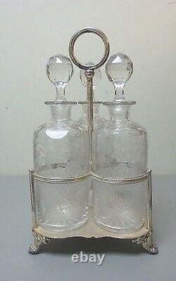 Antique Etched 3-bottle Tantalus, Tall Crystal Decanters In Silver Plate Stand