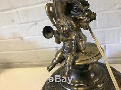 Antique Silver Plated or Spelter Figural Lamp Woman with Shield Child Playing Horn