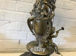 Antique Silver Plated or Spelter Figural Lamp Woman with Shield Child Playing Horn