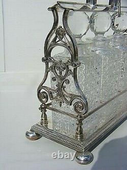 Antique Tantalus Silver Plated 3 Decanters