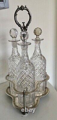 Antique Tantalus Silver Plated With 3 Tall Crystal Decanters