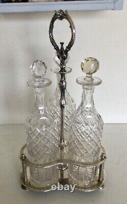 Antique Tantalus Silver Plated With 3 Tall Crystal Decanters