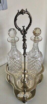 Antique Tantalus Silver Plated With 3 Tall Crystal Decanters