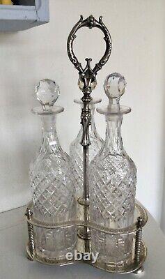 Antique Tantalus Silver Plated With 3 Tall Crystal Decanters