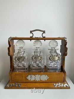 Antique Victorian Oak & Silver Plated Tantalus With 3 Decanters, Labels And Key