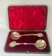 Antique c1907 Pair Ornate Gold Plated Spoons Palm Tops with Dark Metal Climber