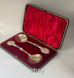 Antique c1907 Pair Ornate Gold Plated Spoons Palm Tops with Dark Metal Climber