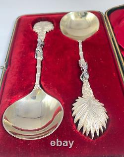Antique c1907 Pair Ornate Gold Plated Spoons Palm Tops with Dark Metal Climber