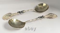 Antique c1907 Pair Ornate Gold Plated Spoons Palm Tops with Dark Metal Climber