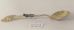 Antique c1907 Pair Ornate Gold Plated Spoons Palm Tops with Dark Metal Climber