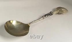 Antique c1907 Pair Ornate Gold Plated Spoons Palm Tops with Dark Metal Climber