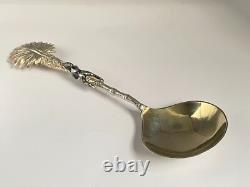 Antique c1907 Pair Ornate Gold Plated Spoons Palm Tops with Dark Metal Climber