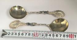 Antique c1907 Pair Ornate Gold Plated Spoons Palm Tops with Dark Metal Climber