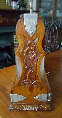 Antique carved oak, engraved 3 bottle Tantulas silver plated mounts and key