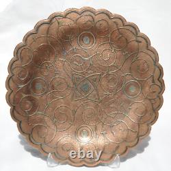 Antique copper silver plate in Islamic Persian style with floral patterning