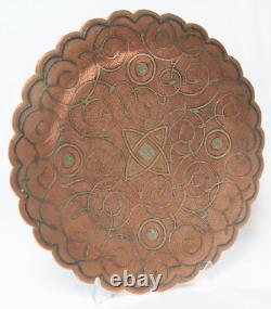 Antique copper silver plate in Islamic Persian style with floral patterning