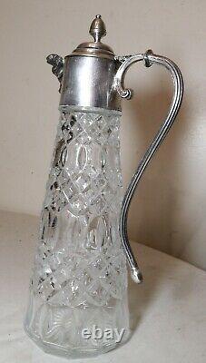 Antique ornate figural English silver plated pressed glass wine claret decanter