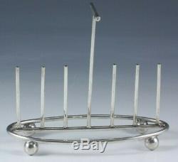 Christopher Dresser style silver plate toast or letter rack, English circa 1890