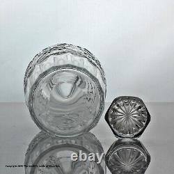 Early Victorian set of three cut glass cylinder decanters, silver plated stand