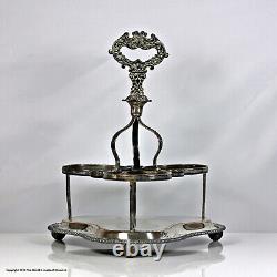 Early Victorian set of three cut glass cylinder decanters, silver plated stand