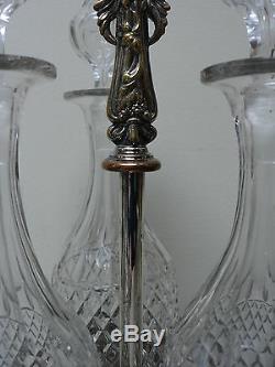 Elegant 3-bottle Tantalus, Tall Crystal Decanters & Silver Plate Stand