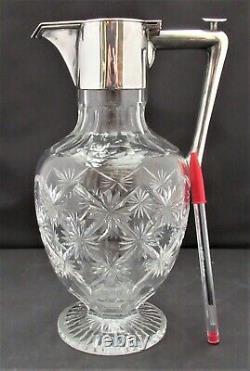 English cut glass claret jug, c1900 with silver plated mount and push button lid