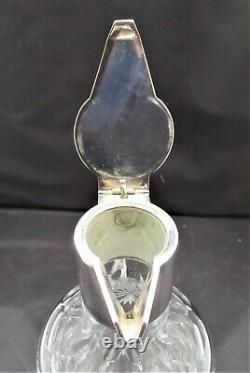 English cut glass claret jug, c1900 with silver plated mount and push button lid