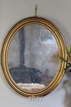 Pair of Antique Gilt Oval Mirrors with Silver Verre Eglomise glass plates